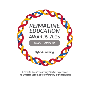 Logo for the Reimagine Education Awards 2015, featuring a colorful twisted ribbon. It indicates a Silver Award for Hybrid Learning presented to the Wharton School.